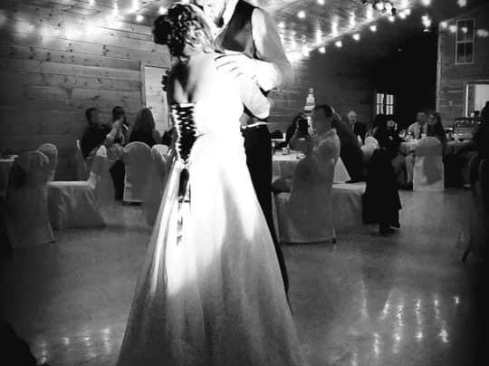 bride and groom dancing