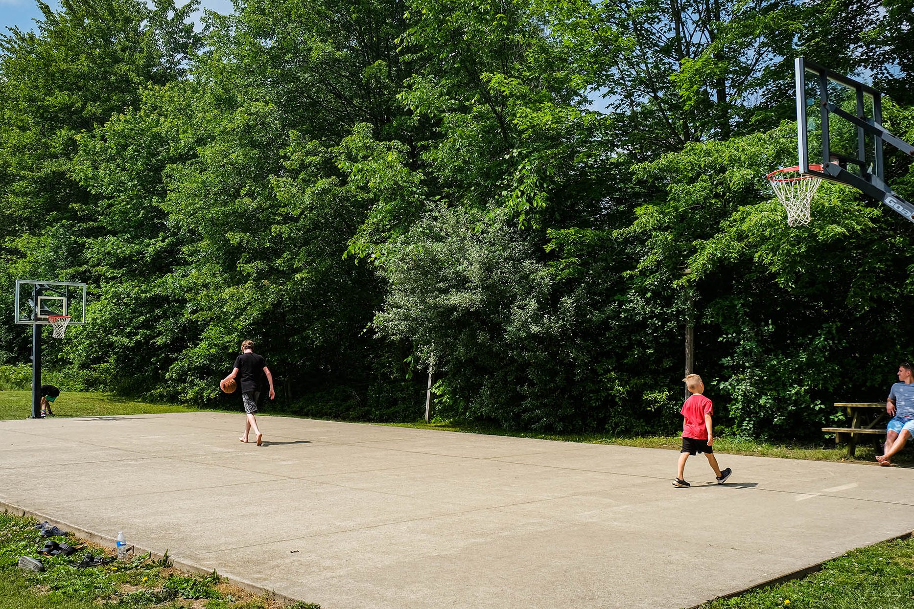 boy playing basketball