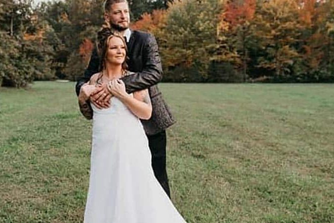 Bride and groom during an outdoor wedding at American Wilderness Campground near Cleveland, Ohio